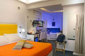 TV a/nebo společenská místnost v ubytování B&B Sorrento Central