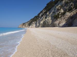 a view of a beach with a cliff at Pure Blue in Athanion