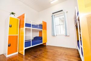 Postel nebo postele na pokoji v ubytování Mad Monkey Central