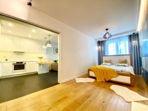 Posteľ alebo postele v izbe v ubytovaní New Wave Apartment Big & Beautiful -parking