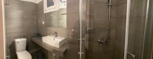 Koupelna v ubytování DIIO Suites