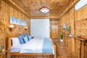 Voodi või voodid majutusasutuse Rice Fields Guesthouse toas