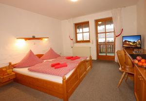 Postel nebo postele na pokoji v ubytování PAGA Hotel