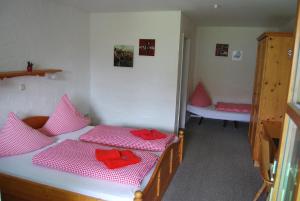 Postel nebo postele na pokoji v ubytování PAGA Hotel