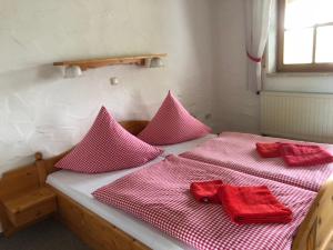 Postel nebo postele na pokoji v ubytování PAGA Hotel