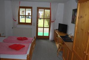 Postel nebo postele na pokoji v ubytování PAGA Hotel