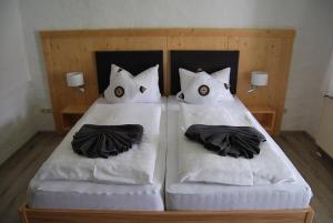 Postel nebo postele na pokoji v ubytování PAGA Hotel