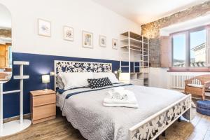 Postel nebo postele na pokoji v ubytování B&B Grano e Lavanda
