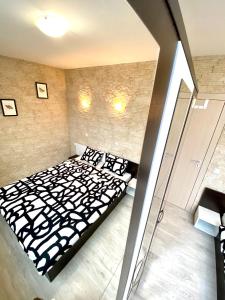 A bed or beds in a room at Sea View NewApartment-Bulgaria-Chernomorets