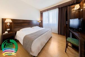 Telewizja i/lub zestaw kina domowego w obiekcie Hotel Delfino Venezia Mestre