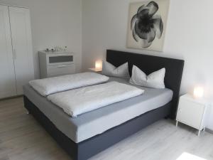 Ένα ή περισσότερα κρεβάτια σε δωμάτιο στο Haus Linde Frauenwald am Rennsteig