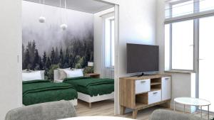 sypialnia z dwoma łóżkami i telewizorem w obiekcie Apartament przy Krupowkach w Zakopanem