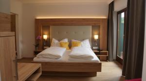 Ferienhotel Hofer superior客房内的一张或多张床位