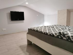 Postel nebo postele na pokoji v ubytování Apartament Szklane Tarasy