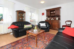Posezení v ubytování Jever-Ferienhaus Gartenblick
