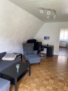 Posezení v ubytování Ferienwohnungen Thingslinde