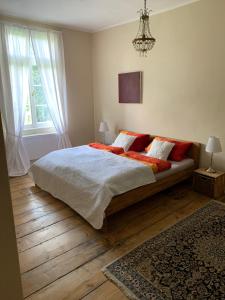 Кровать или кровати в номере Gutshaus Schwarzenhof