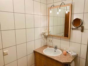 Koupelna v ubytování Hotel Zum Fliegerwirt