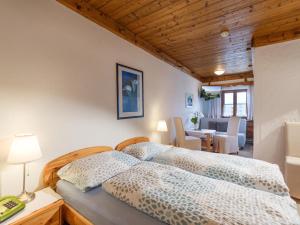 Letto o letti in una camera di Hotel Baumgarten & Chalet Baumgarten