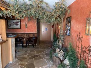 a living room with a hallway with a room with at Hotel Zum Fliegerwirt in Mengen