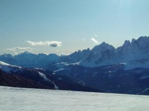 a view of a mountain range with snow on the ground at A un passo dal...centro in San Candido