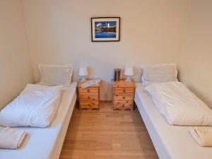 Postel nebo postele na pokoji v ubytování Skyrhusid HI Hostel