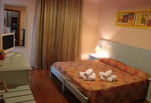 Posteľ alebo postele v izbe v ubytovaní Bosa Guest House