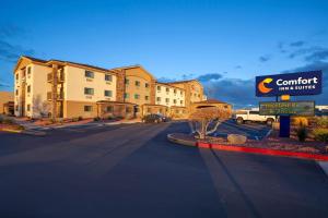 a building with a sign on the side of a street at Comfort Inn & Suites Page at Lake Powell in Page