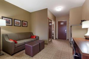 a living room with a couch and a table at Comfort Inn & Suites Page at Lake Powell in Page
