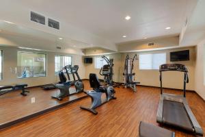 a gym with treadmills and ellipticals in a room at Comfort Inn & Suites Page at Lake Powell in Page