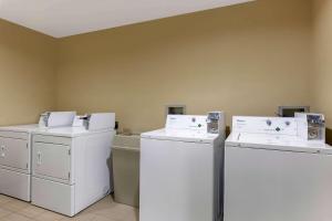 a laundry room with white washers and dryers at Comfort Inn & Suites Page at Lake Powell in Page