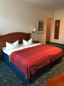 Ένα ή περισσότερα κρεβάτια σε δωμάτιο στο Hotel Johannishof