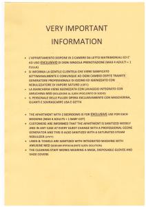 un documento mecanografiado en la parte superior de una página amarilla en Valverde Guest House en Tarquinia