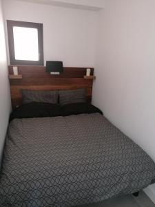 Postel nebo postele na pokoji v ubytování Les Mégalithes