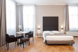 Posteľ alebo postele v izbe v ubytovaní Hotel Palazzo Martinelli Dolfin