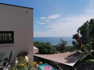 a view of the ocean from a house at Les Mégalithes in Sète +11 photos