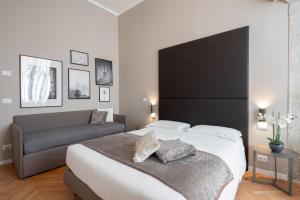 Posteľ alebo postele v izbe v ubytovaní Hotel Palazzo Martinelli Dolfin