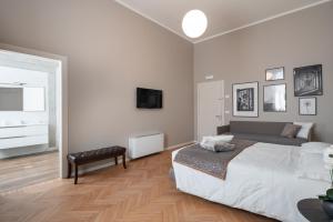 Posteľ alebo postele v izbe v ubytovaní Hotel Palazzo Martinelli Dolfin