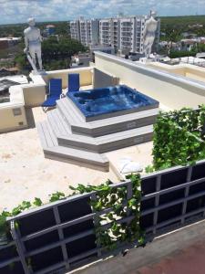 Bazén v ubytování Elegant apartment with Jacuzzi in Boca Chica - 200 m² nebo v jeho okolí