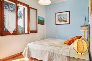 Posteľ alebo postele v izbe v ubytovaní Helimos B&B with Segesta Temple view near Castellammare del Golfo