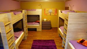 A bed or beds in a room at Bavaria City Hostel - Design Hostel