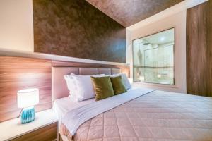 Кровать или кровати в номере Boutique Hotel "Salina"