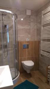 Kúpeľňa v ubytovaní Apartament Słoneczny