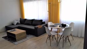 Posedenie v ubytovaní Apartament Słoneczny