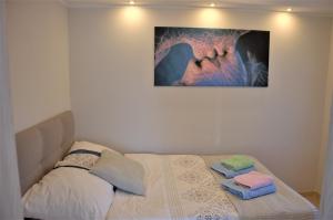 Posteľ alebo postele v izbe v ubytovaní Apartament Słoneczny