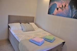 Posteľ alebo postele v izbe v ubytovaní Apartament Słoneczny