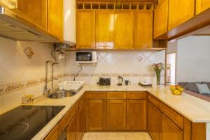 Kuchyň nebo kuchyňský kout v ubytování Casa confortável no centro da cidade + 5 fotografií