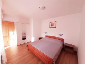 Katil atau katil-katil dalam bilik di Apartments Mužić Cres II