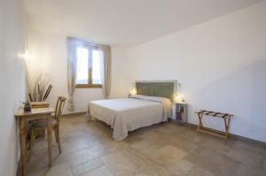 Agriturismo Casa Ricci客房内的一张或多张床位