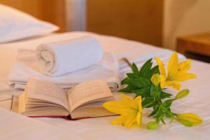 Letto o letti in una camera di Hotel Saudade